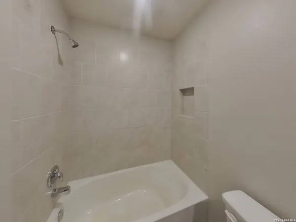 a bathroom with a bathtub