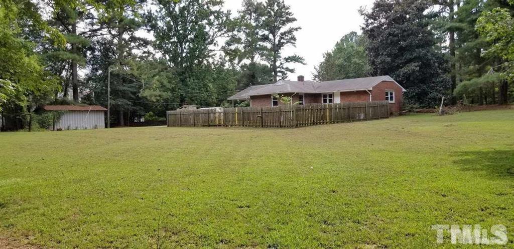 2925 Mt Moriah Road Durham, NC 27707 - Photo 17 of 18 a view of a house with a yard