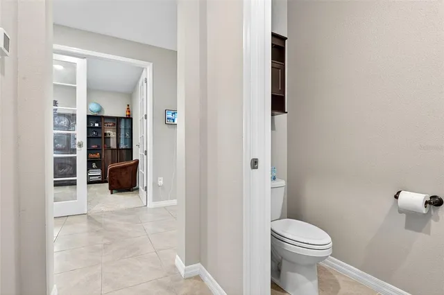 a bathroom with a toilet and a sink
