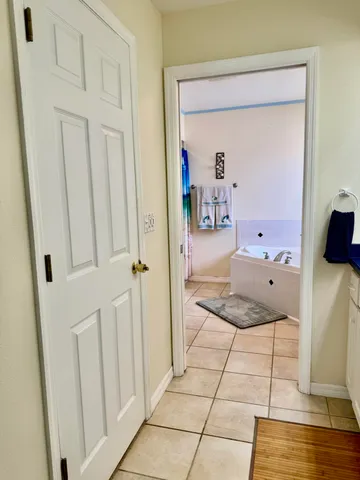 a bathroom with a vanity and a mirror