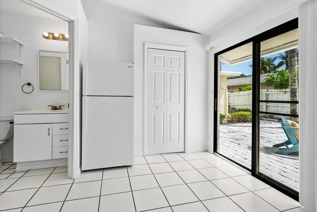 a bedroom with furniture and window