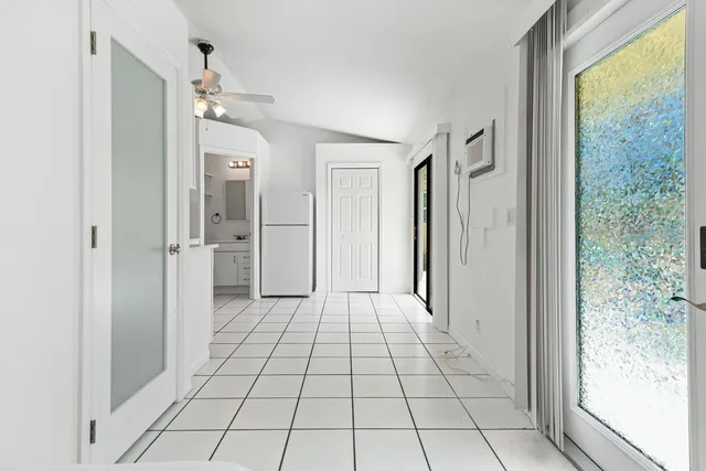 a view of an empty room and window