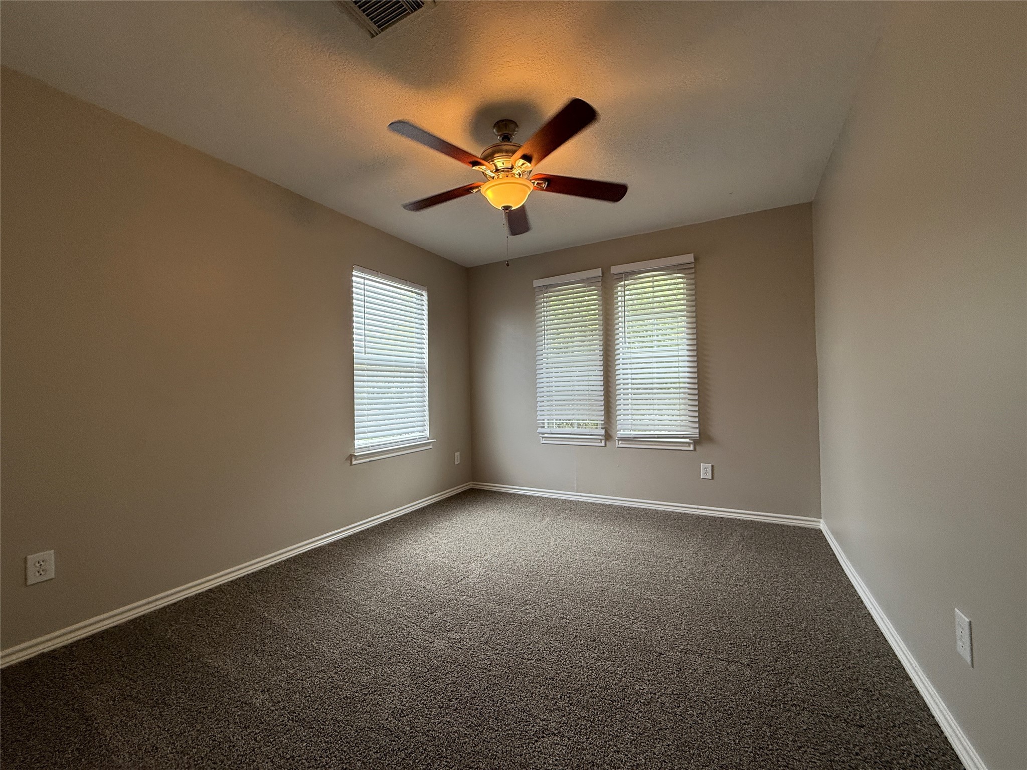 2325 Shady Tree Lane Conroe, TX 77301 - Photo 14 of 22 a view of an empty room with a window