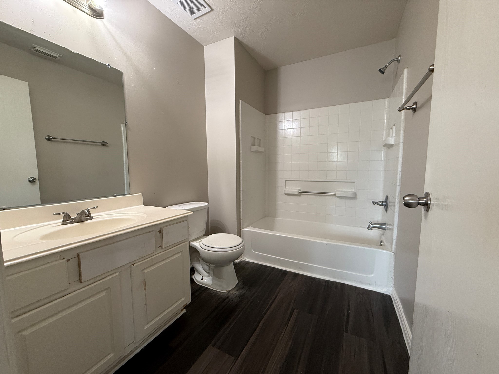 2325 Shady Tree Lane Conroe, TX 77301 - Photo 15 of 22 a bathroom with a bathtub shower sink vanity and toilet