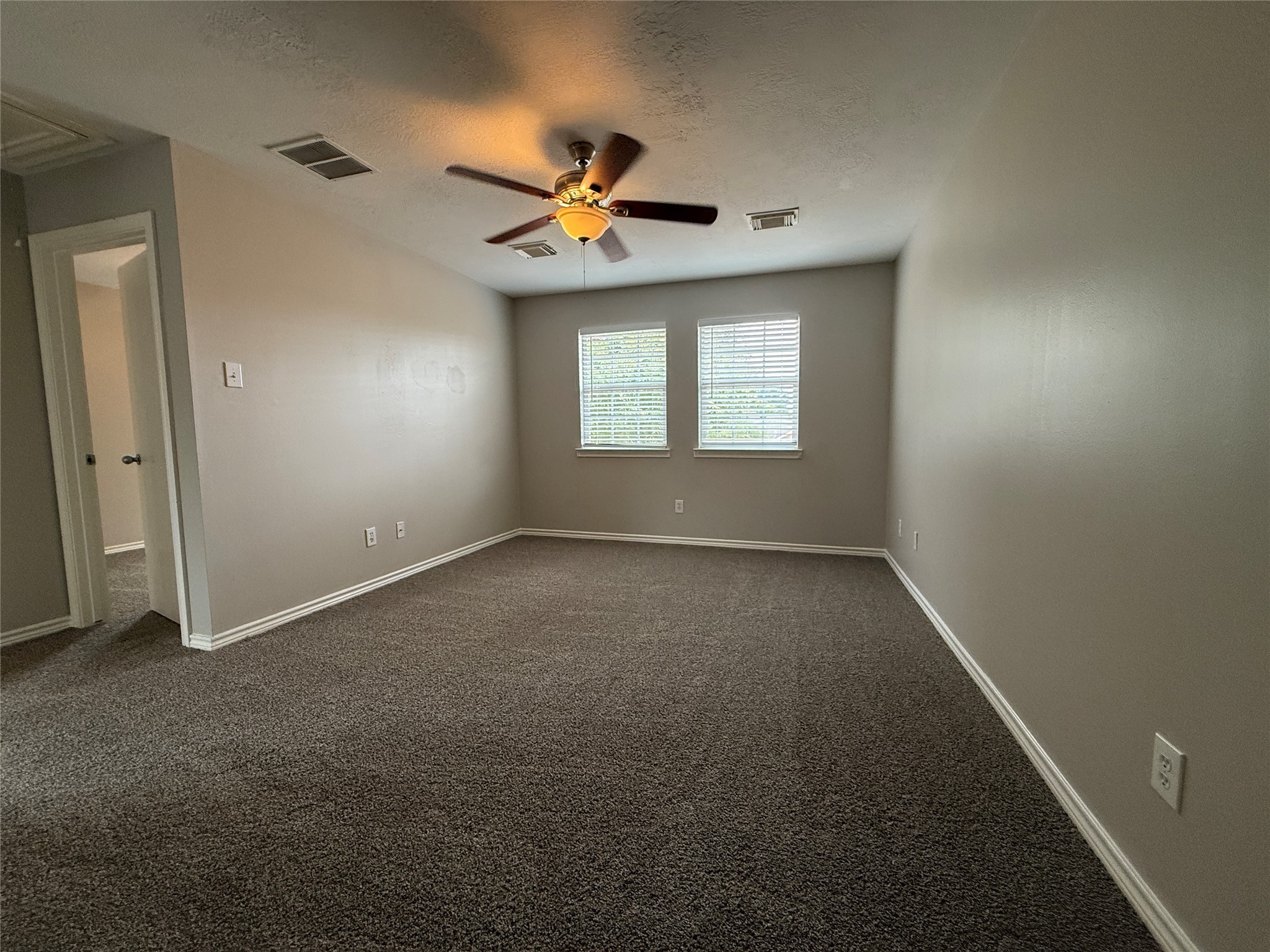2325 Shady Tree Lane Conroe, TX 77301 - Photo 16 of 22 a view of an empty room with a window