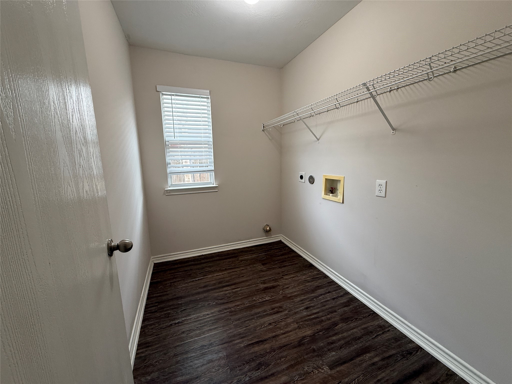 2325 Shady Tree Lane Conroe, TX 77301 - Photo 18 of 22 a view of an empty room with wooden floor and a window