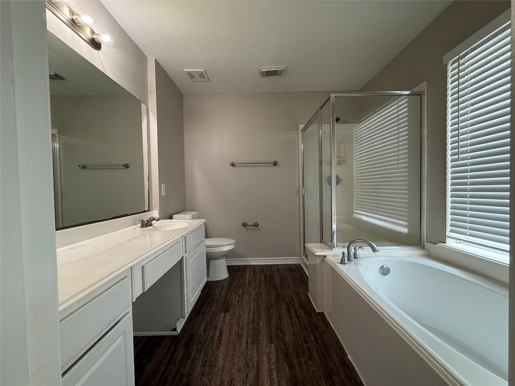 2325 Shady Tree Lane Conroe, TX 77301 - Photo 20 of 22 a bathroom with a large tub sink shower and a mirror