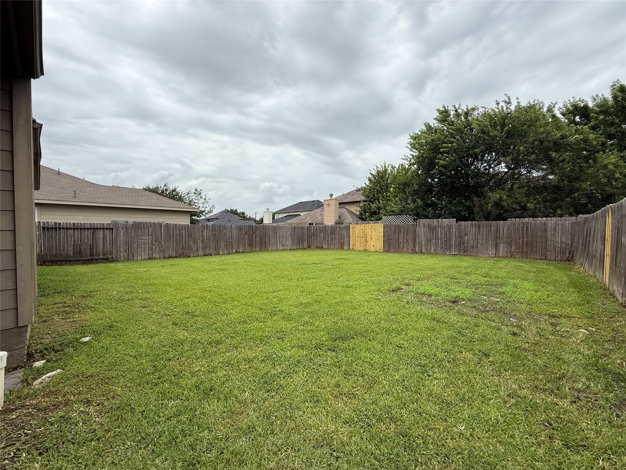 2325 Shady Tree Lane Conroe, TX 77301 - Photo 22 of 22 a view of a back yard