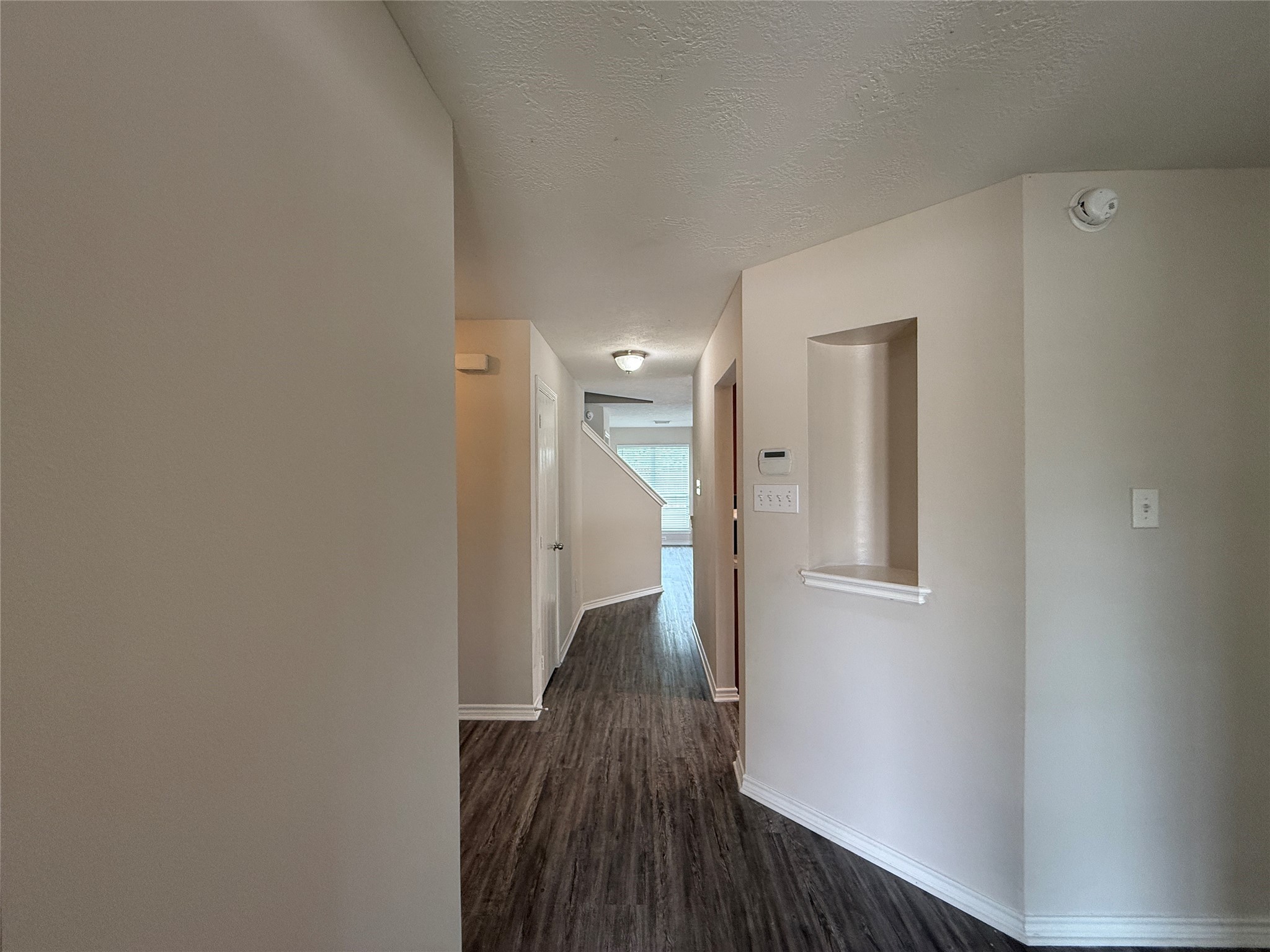 2325 Shady Tree Lane Conroe, TX 77301 - Photo 10 of 22 a view of hallway with wooden floor