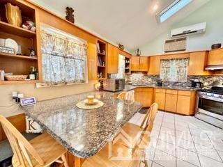 57 Eardley Road Edison, NJ 08817 - Photo 18 of 33 a large kitchen with granite countertop lots of counter space and windows