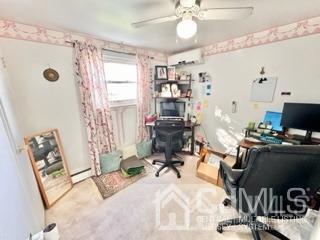 57 Eardley Road Edison, NJ 08817 - Photo 30 of 33 a view of a workspace with furniture and a window