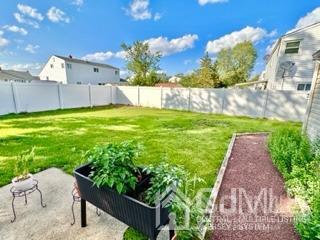 57 Eardley Road Edison, NJ 08817 - Photo 10 of 33 a garden view with a seating space
