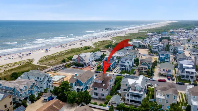 a view of multiple houses with outdoor space