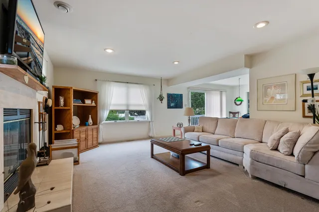 a living room with furniture and a couch