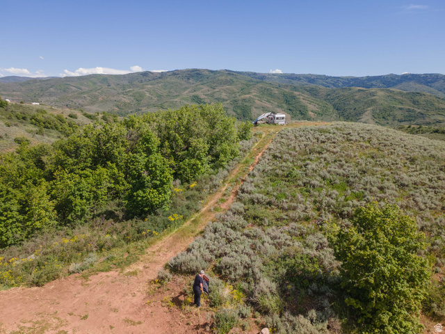 73 North River View Road, Unit 73 Huntsville, UT 84317 - Photo 5 of 21 Expansive undeveloped land featuring rolling hills and distant mountainous terrain
