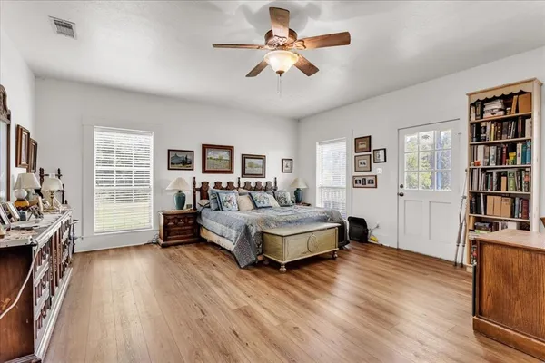 a bathroom with a double vanity sink and mirror
