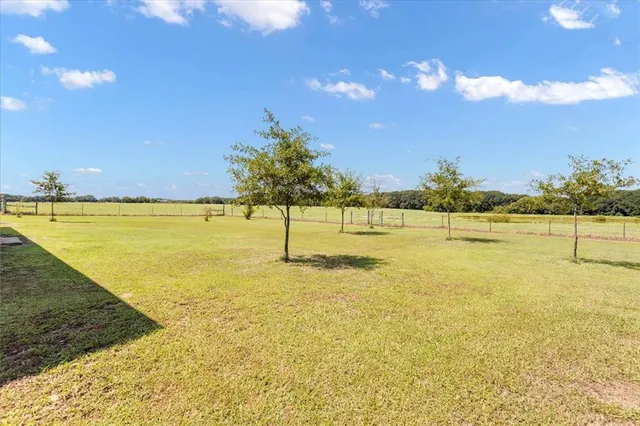 a view of a large body of water with water fall