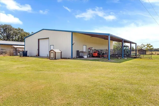 a view of yard with large tree