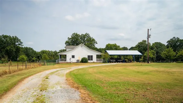 a view of a house with a swimming pool