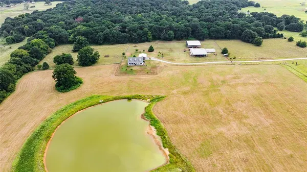 a view of a swimming pool with a lake view