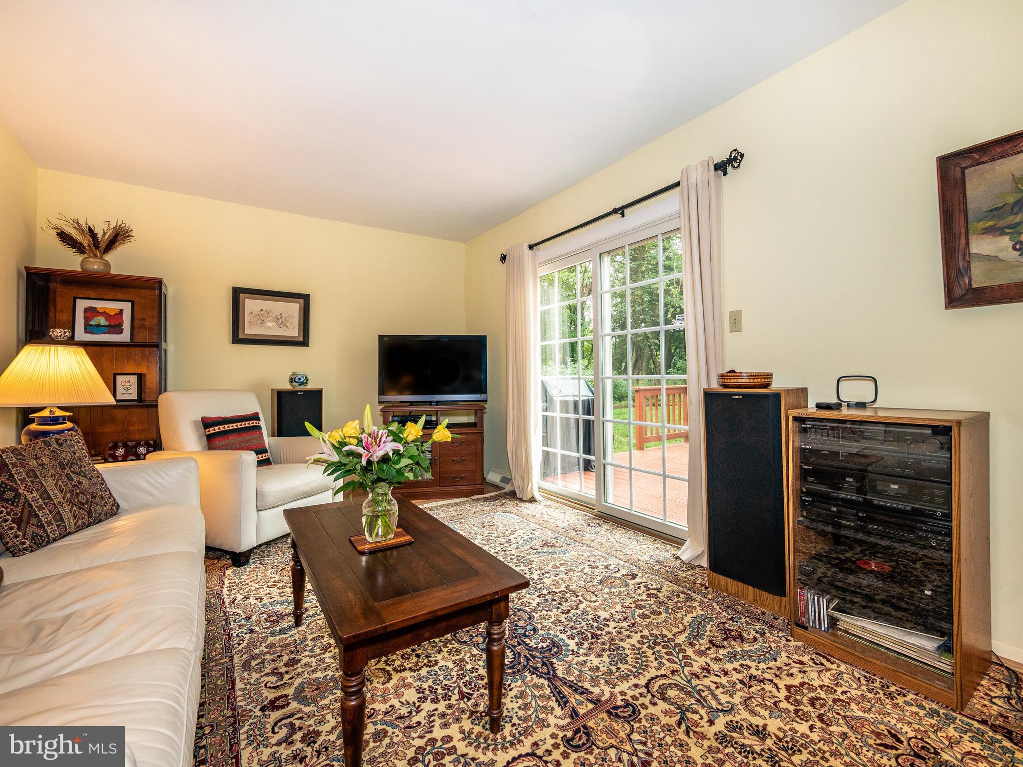 5242 Eliots Oak Road Columbia, MD 21044 - Photo 14 of 30 Spacious family room with slider to decking