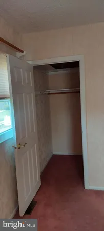 a view of a room with an empty shower