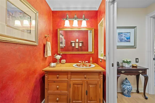 a view of a house with backyard sitting area and garden