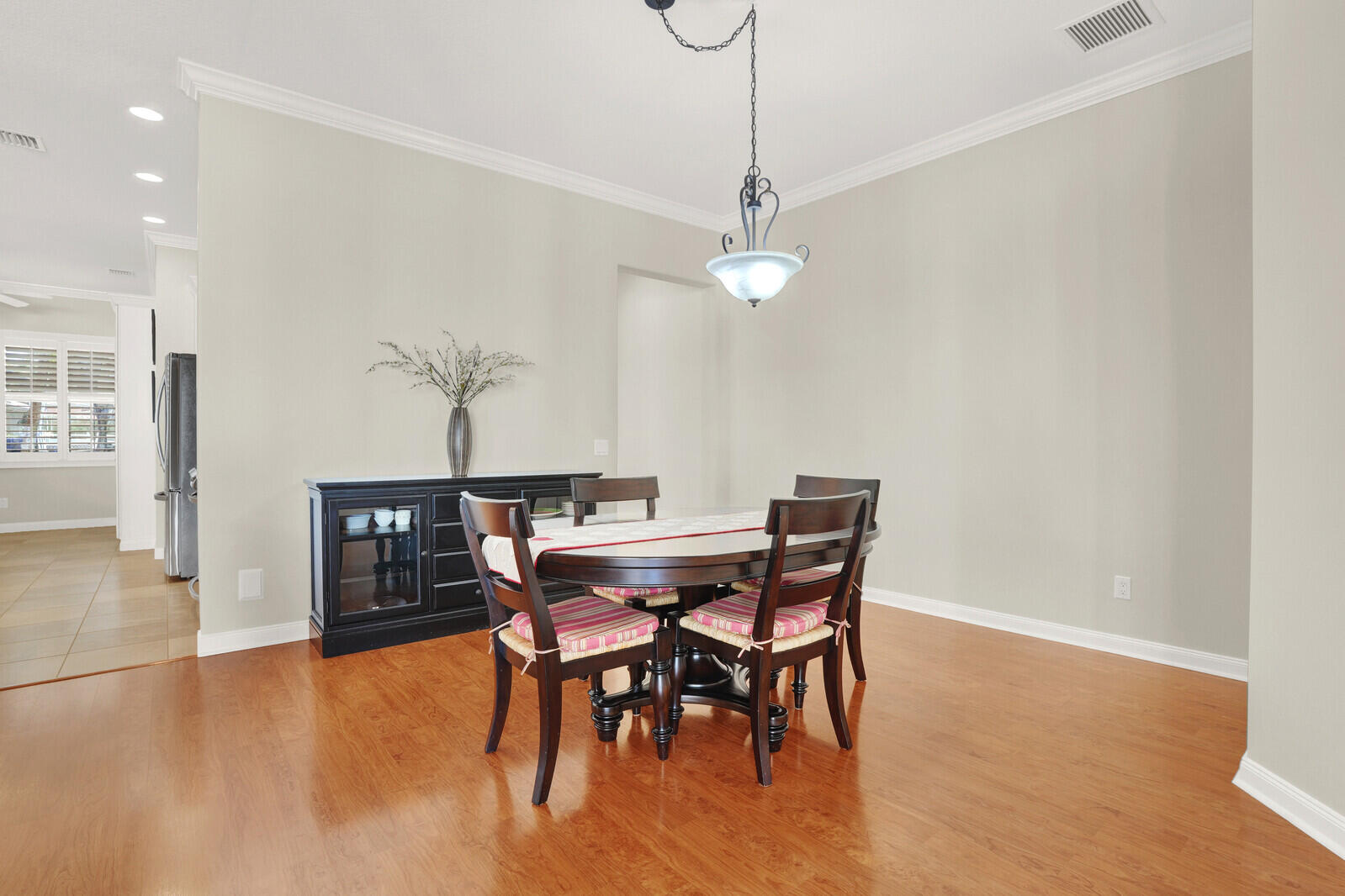 2688 East Community Drive Jupiter, FL 33458 - Photo 21 of 50 a view of a dining room with furniture