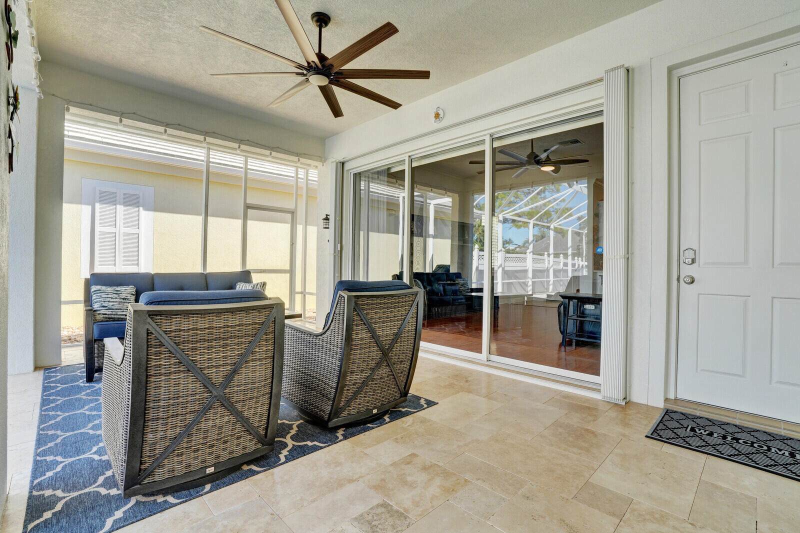 2688 East Community Drive Jupiter, FL 33458 - Photo 35 of 50 a view of a livingroom with furniture and a ceiling fan