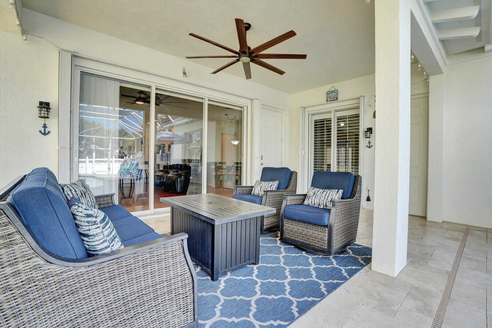 2688 East Community Drive Jupiter, FL 33458 - Photo 36 of 50 a living room with furniture and a large window