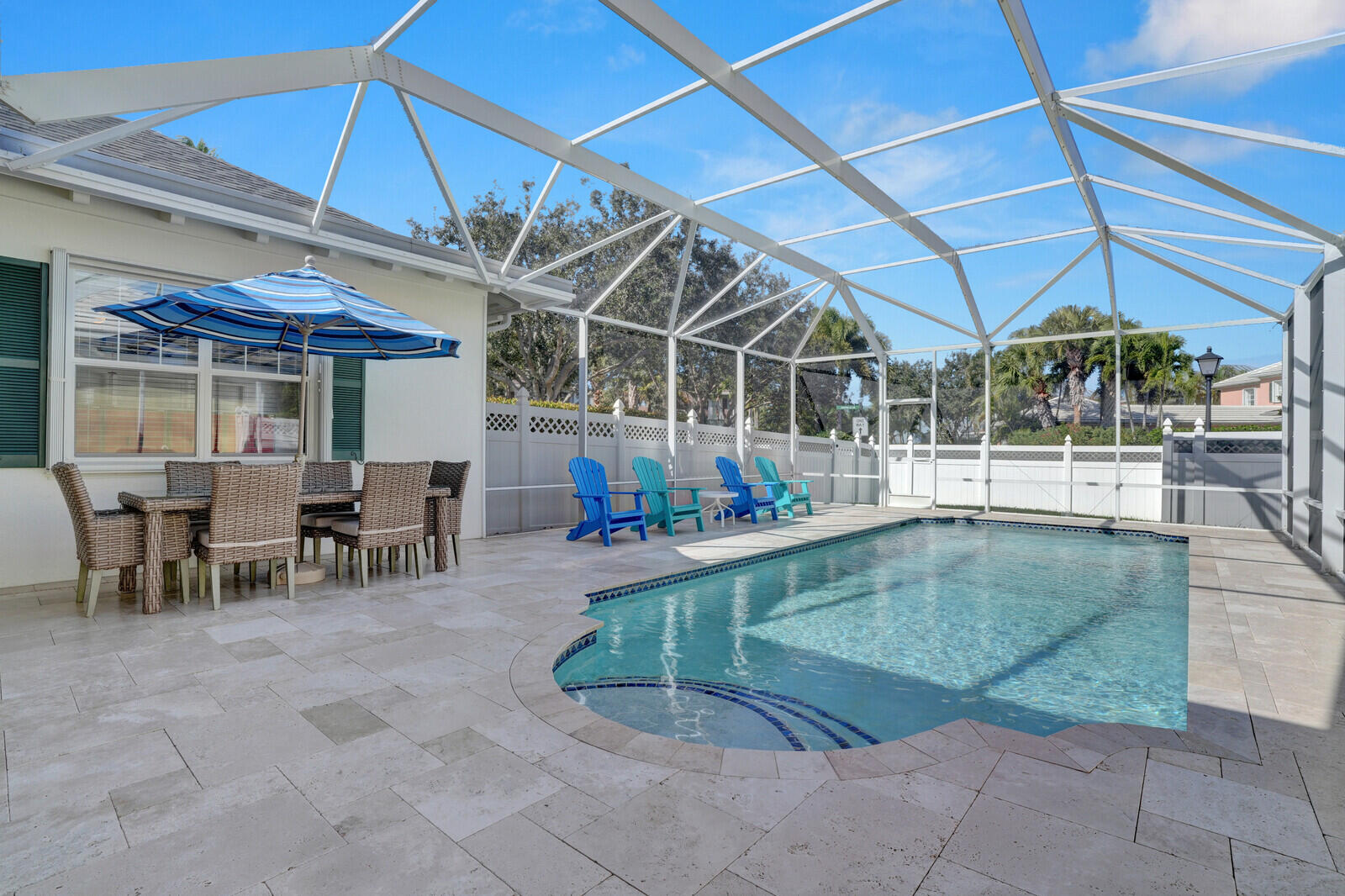 2688 East Community Drive Jupiter, FL 33458 - Photo 37 of 50 a view of a swimming pool with outdoor seating
