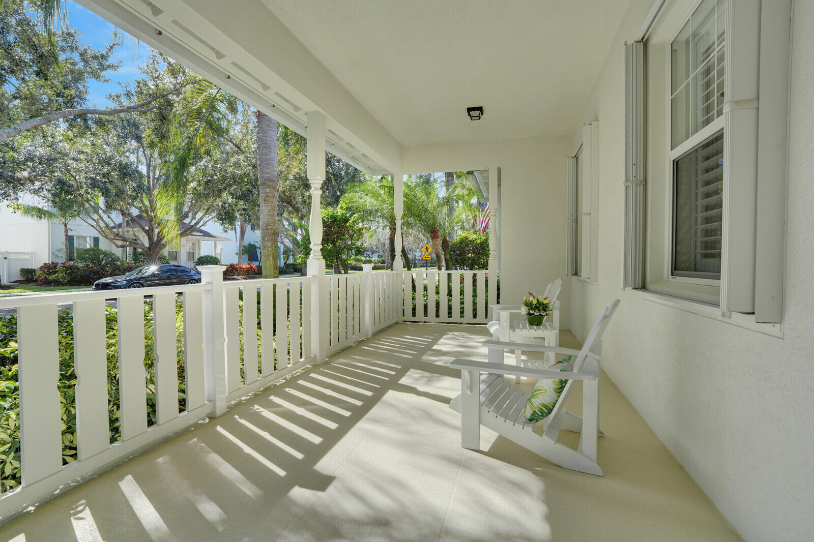 2688 East Community Drive Jupiter, FL 33458 - Photo 4 of 50 a view of a porch with wooden floor