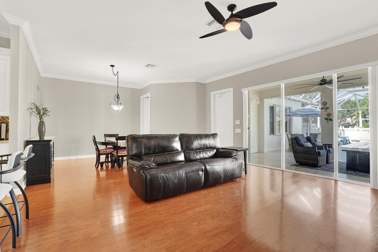 2688 East Community Drive Jupiter, FL 33458 - Photo 7 of 50 a living room with furniture and a large window