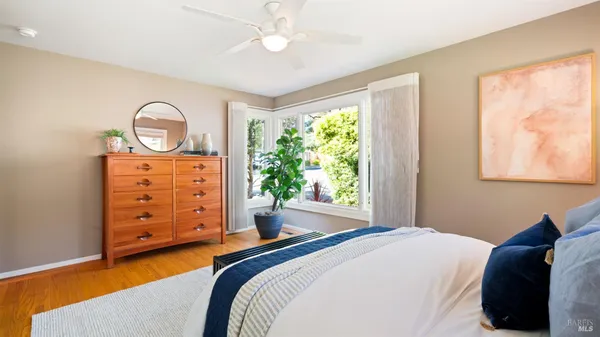a view of a backyard with sitting area