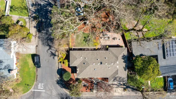 an aerial view of residential house with outdoor space