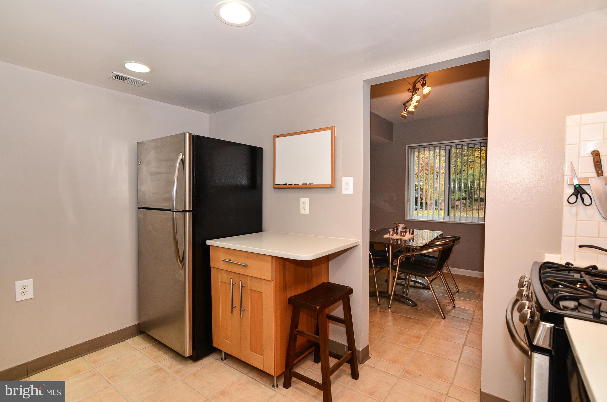 1406 Northgate Square, Unit 1A Reston, VA 20190 - Photo 8 of 38 Updated kitchen