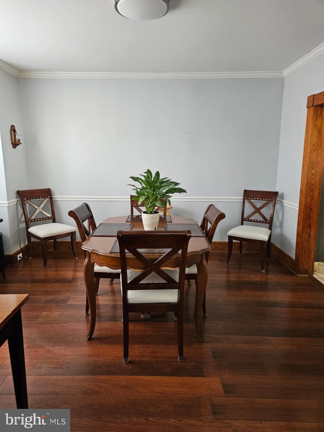 3911 4th Street Baltimore, MD 21225 - Photo 13 of 18 a workspace with furniture and wooden floor