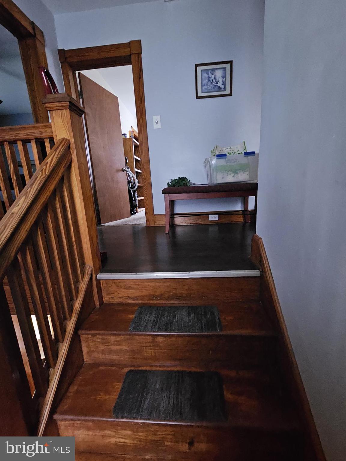 3911 4th Street Baltimore, MD 21225 - Photo 15 of 18 a view of entryway and hall with wooden floor
