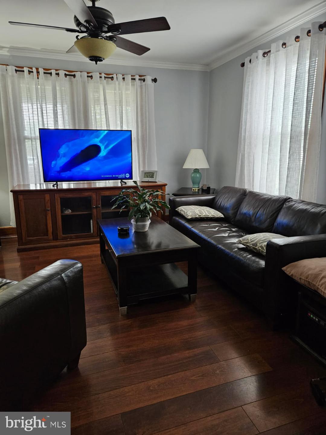 3911 4th Street Baltimore, MD 21225 - Photo 9 of 18 a living room with furniture pool table and a window