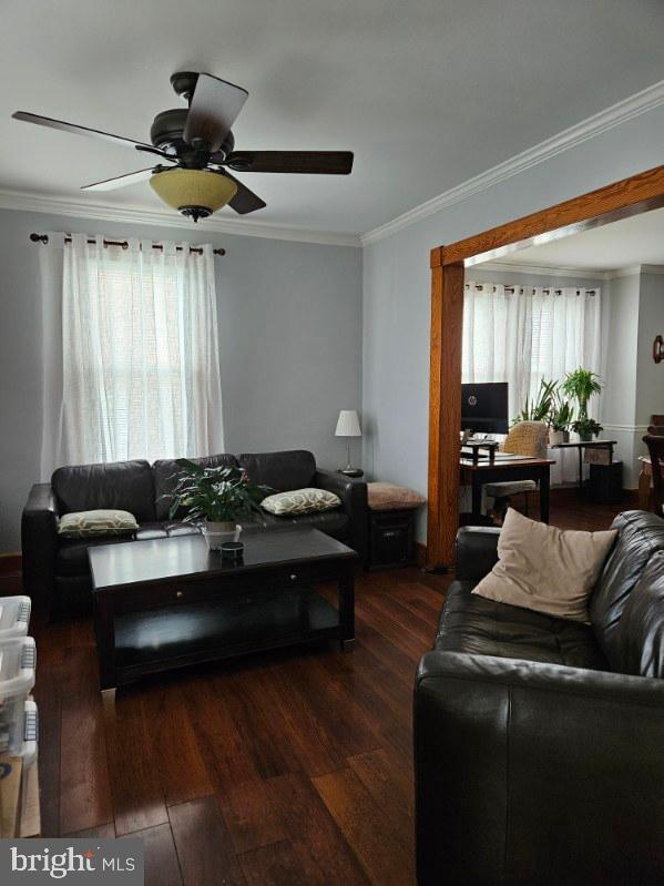 3911 4th Street Baltimore, MD 21225 - Photo 10 of 18 a living room with furniture and a large window