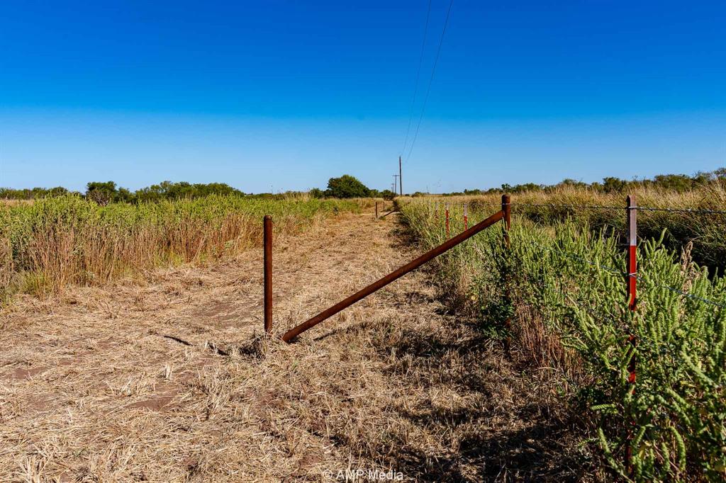 1504 Cr 423 Rule Tx 79547 Haskell, TX 79521 - Photo 9 of 26 a view of a dry yard with wooden fence