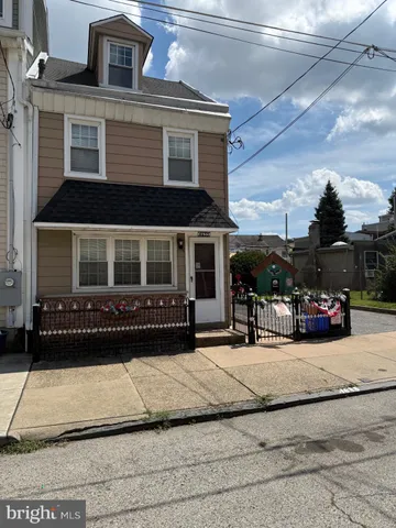 a view of a house with a patio