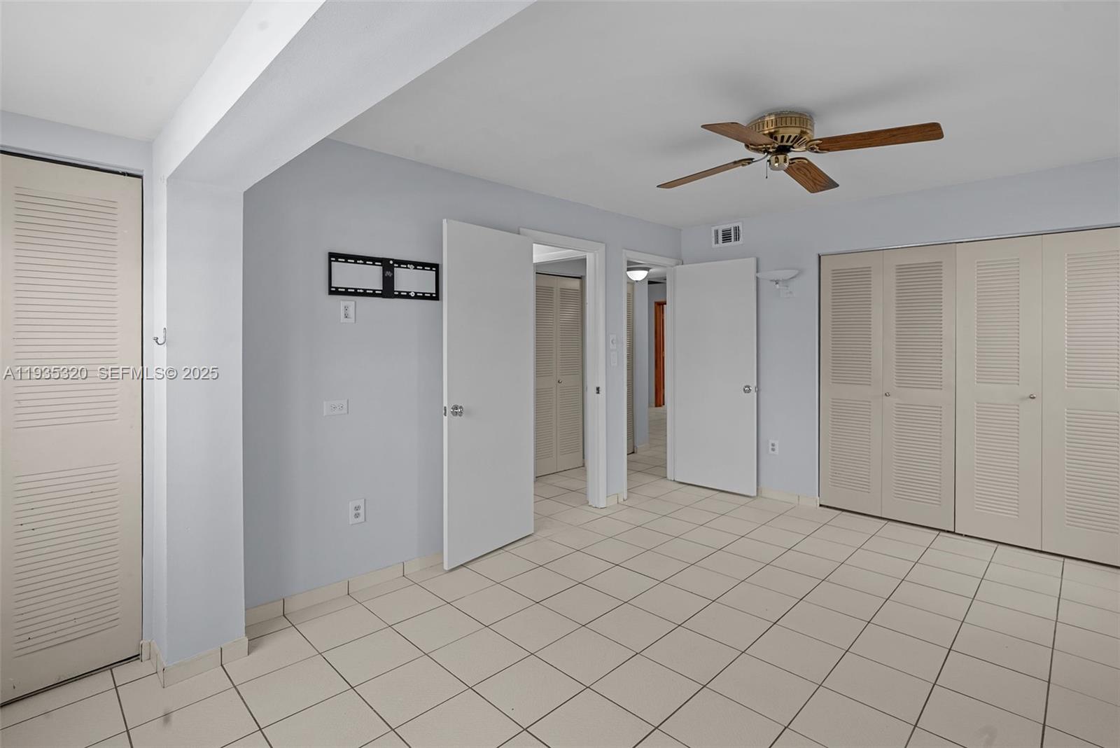 10922 Southwest 25th Street Miami, FL 33165 - Photo 12 of 33 a view of an empty room