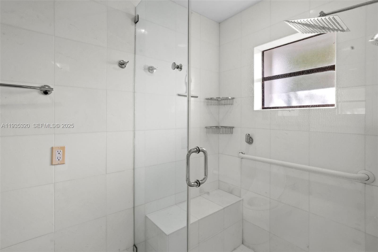 10922 Southwest 25th Street Miami, FL 33165 - Photo 20 of 33 a bathroom with a shower