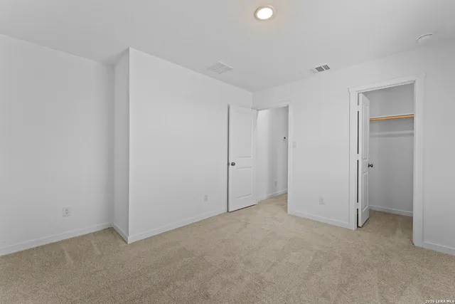 a picture of a bathroom with a shower