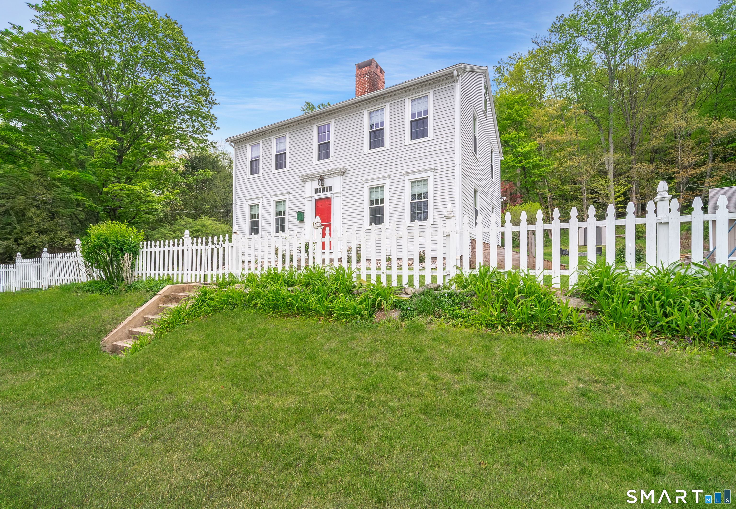 230 Killingworth Road Haddam, CT 06441 - Photo 3 of 36 a view of a house with a yard and a garden