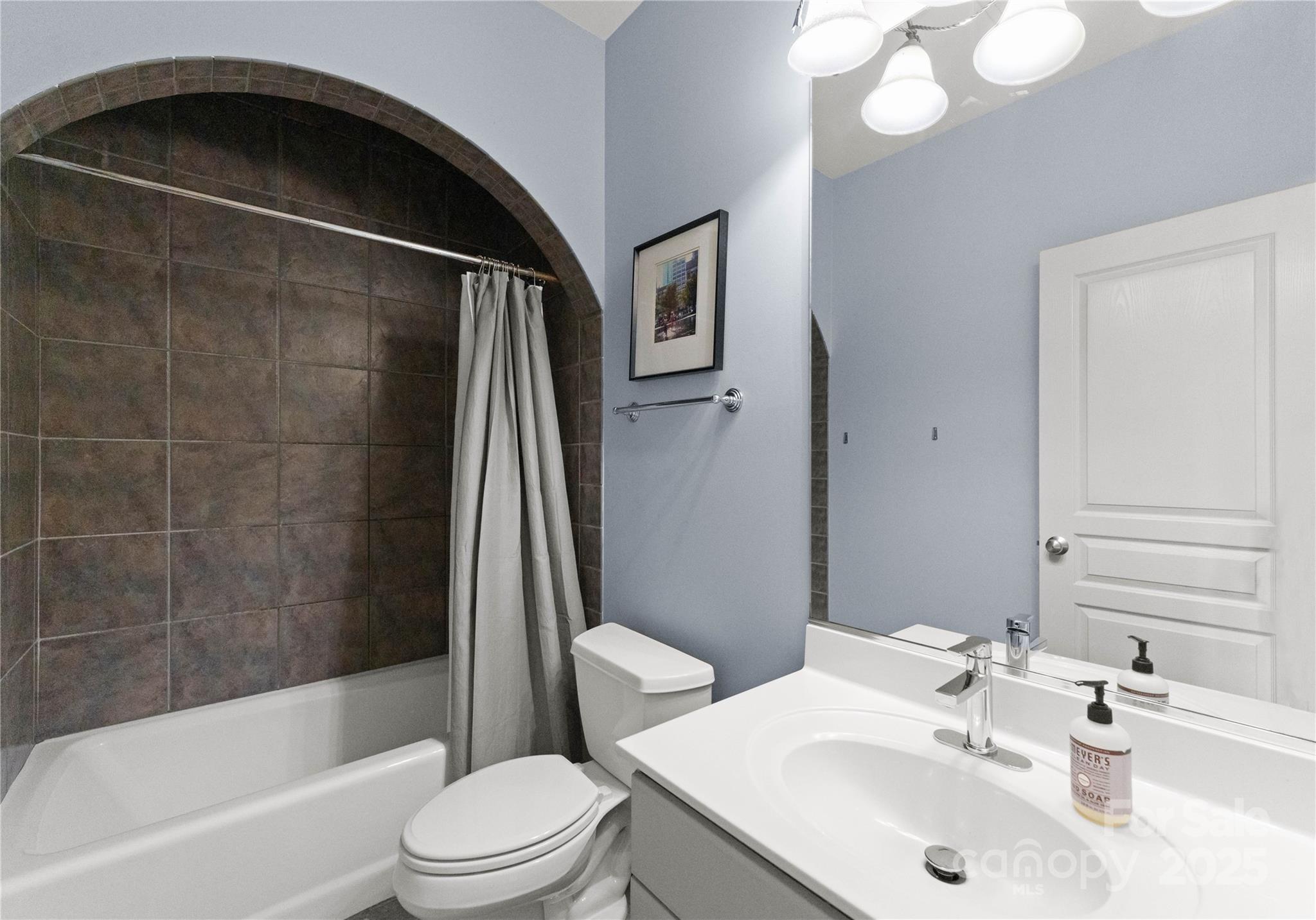 8813 Covey Rise Court Charlotte, NC 28226 - Photo 34 of 47 a bathroom with a sink toilet and shower