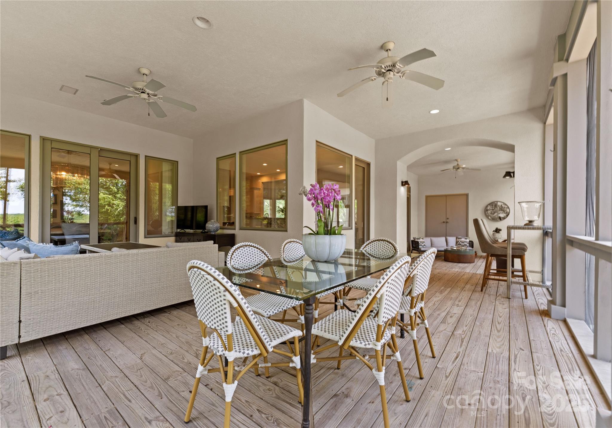 8813 Covey Rise Court Charlotte, NC 28226 - Photo 40 of 47 a view of a dining room with furniture window and wooden floor