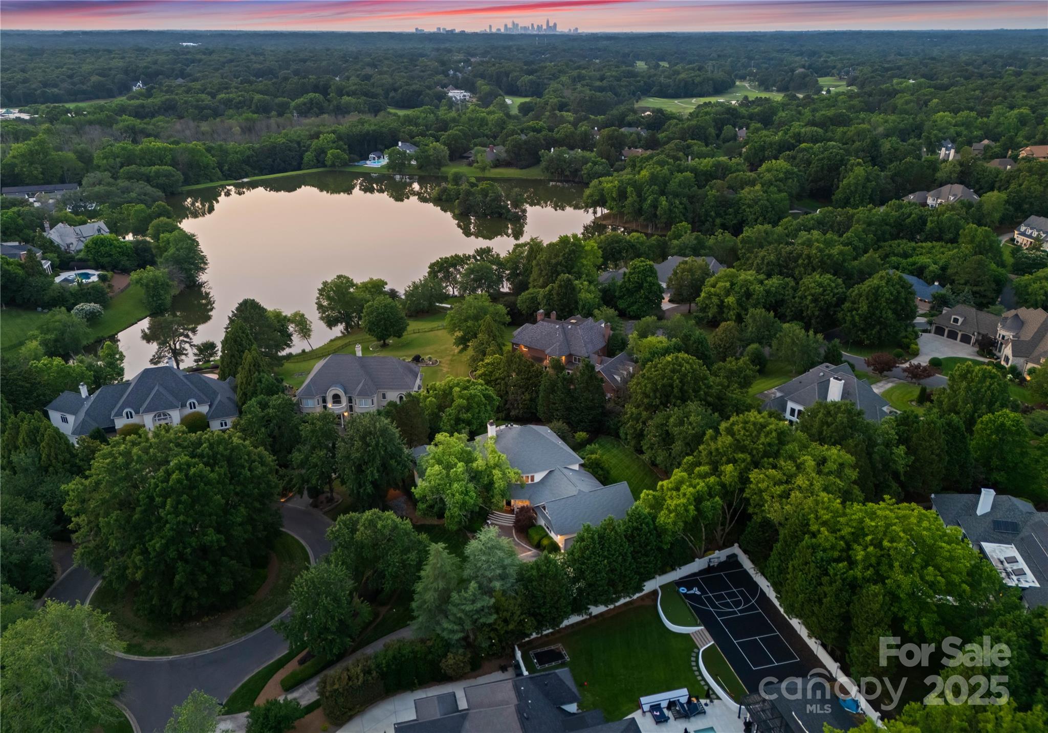 8813 Covey Rise Court Charlotte, NC 28226 - Photo 47 of 47 an aerial view of lake and residential houses with outdoor space