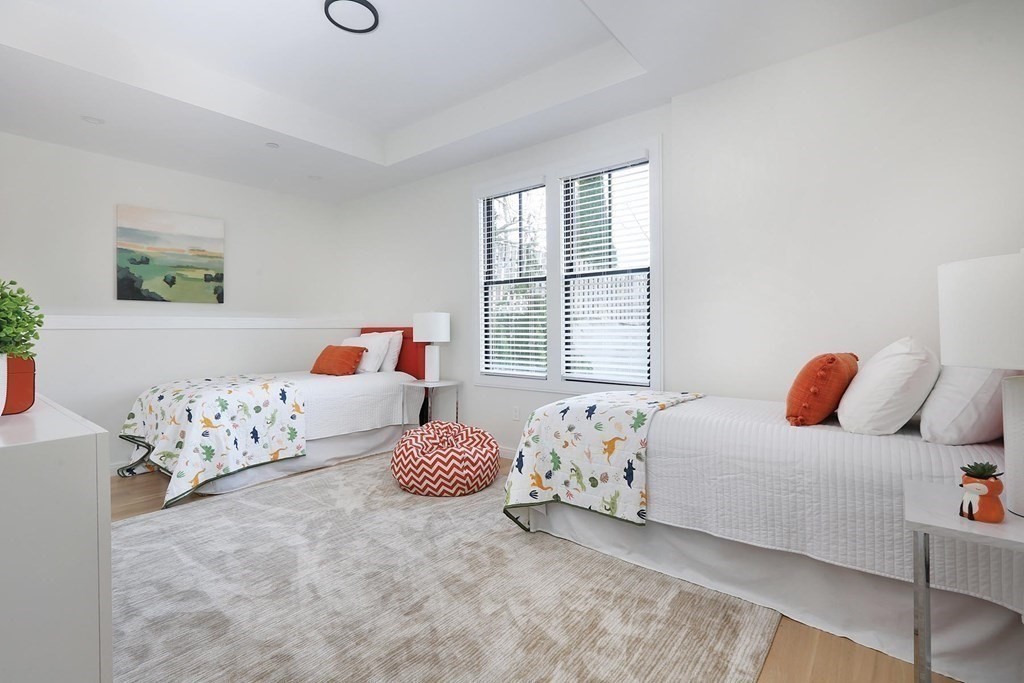 41 Summit Avenue, Unit 41 Brookline, MA 02446 - Photo 14 of 20 a bedroom with bed and a window